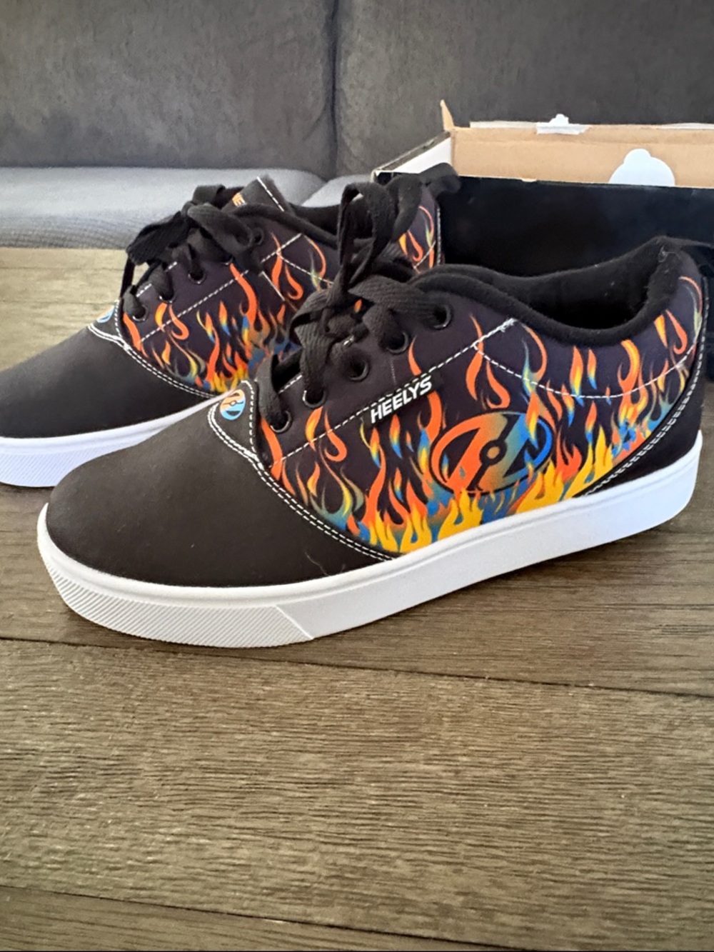 Heelys Men's Black Sneakers with Orange Yellow and Blue Flame Design
